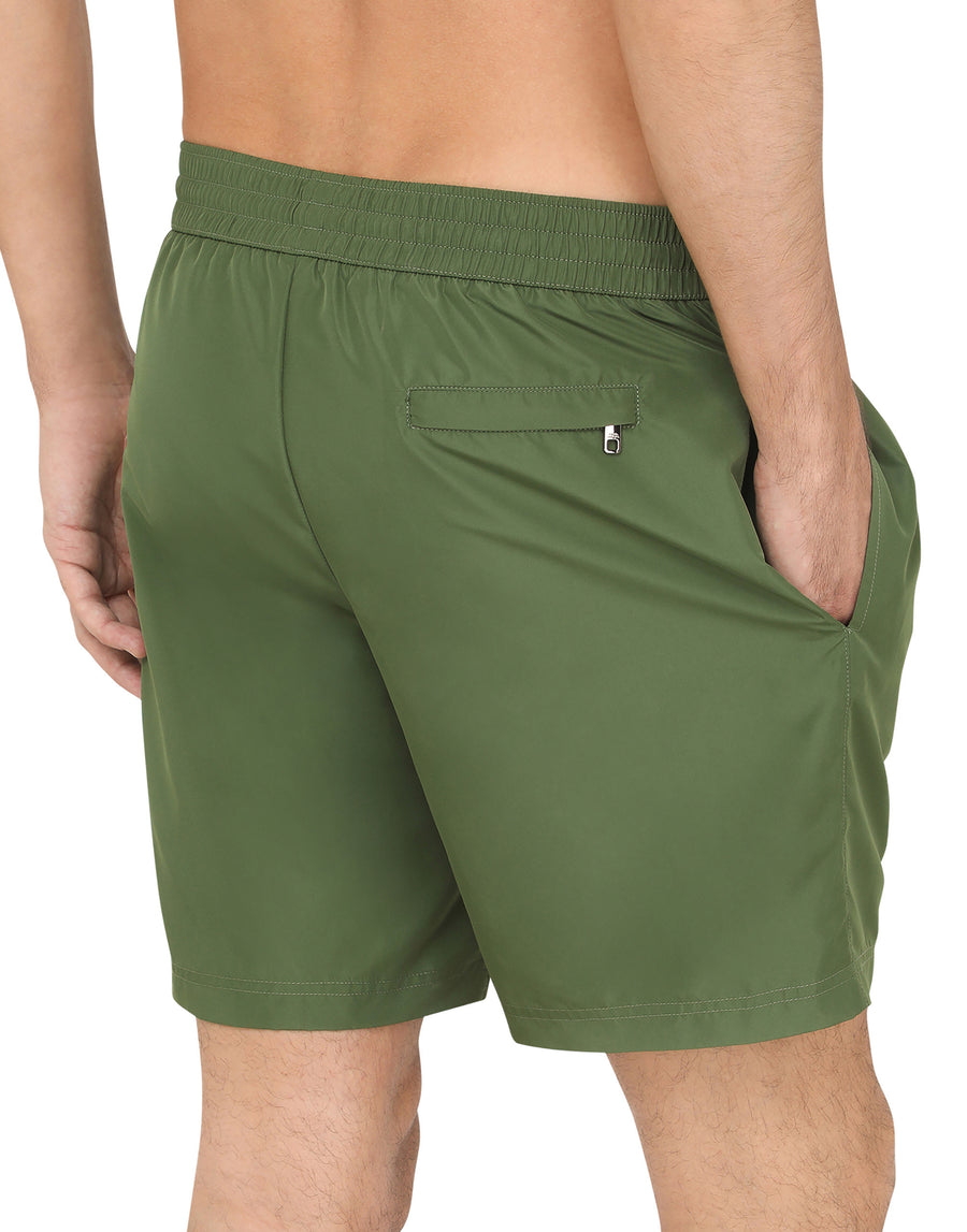 Mid-length swim trunks with branded plate