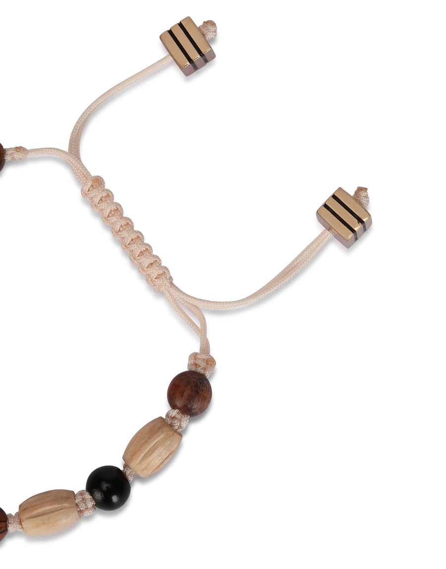 Cord bracelet with wooden spheres