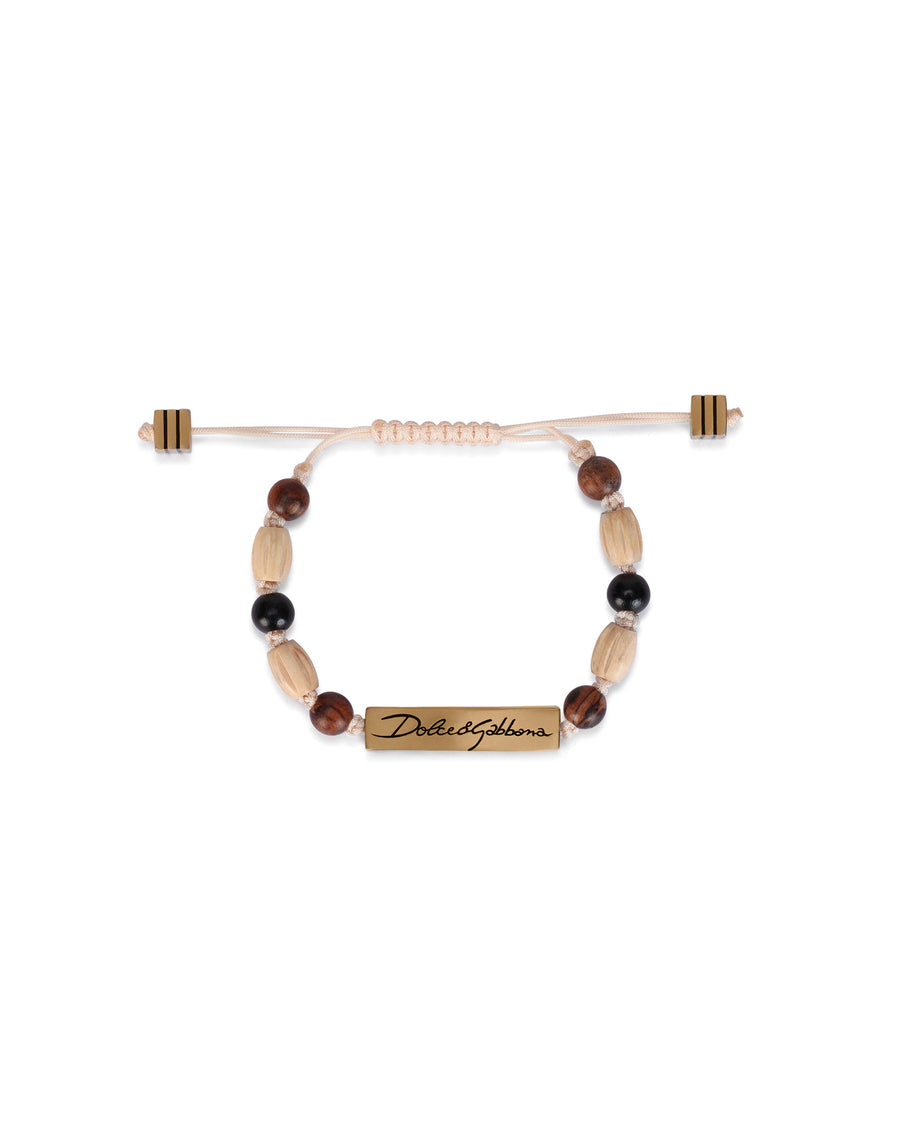 Cord bracelet with wooden spheres