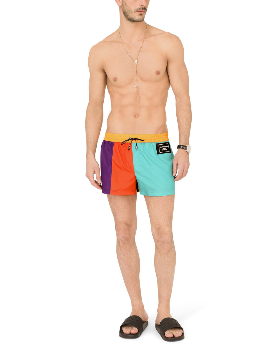 Short nylon patchwork swim trunks with patch