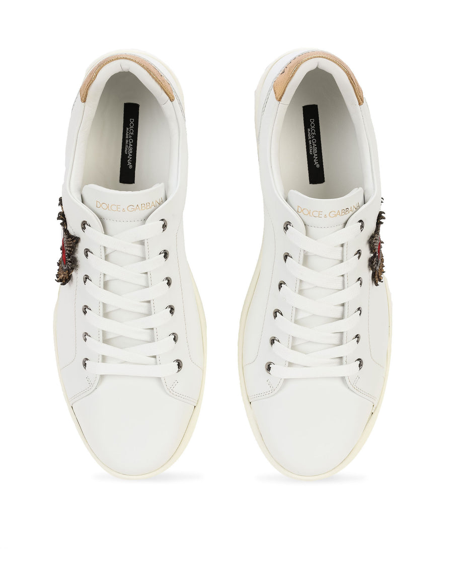 Sneakers with laces and sacred heart